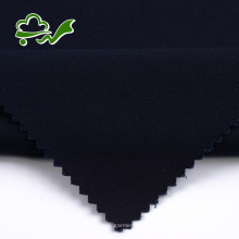 Tejido de sarga azul marino de algodón orgánico para pantalones